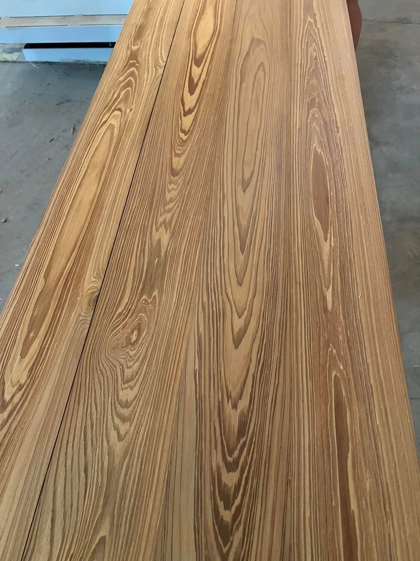Waterproof solid wood for showers and wet areas. Real White Oak, Antique Heart Pine, and Cypress — 100% green and waterproof