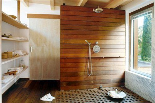 Waterproof solid wood for showers and wet areas. Real White Oak, Antique Heart Pine, and Cypress — made for high-humidity spaces.