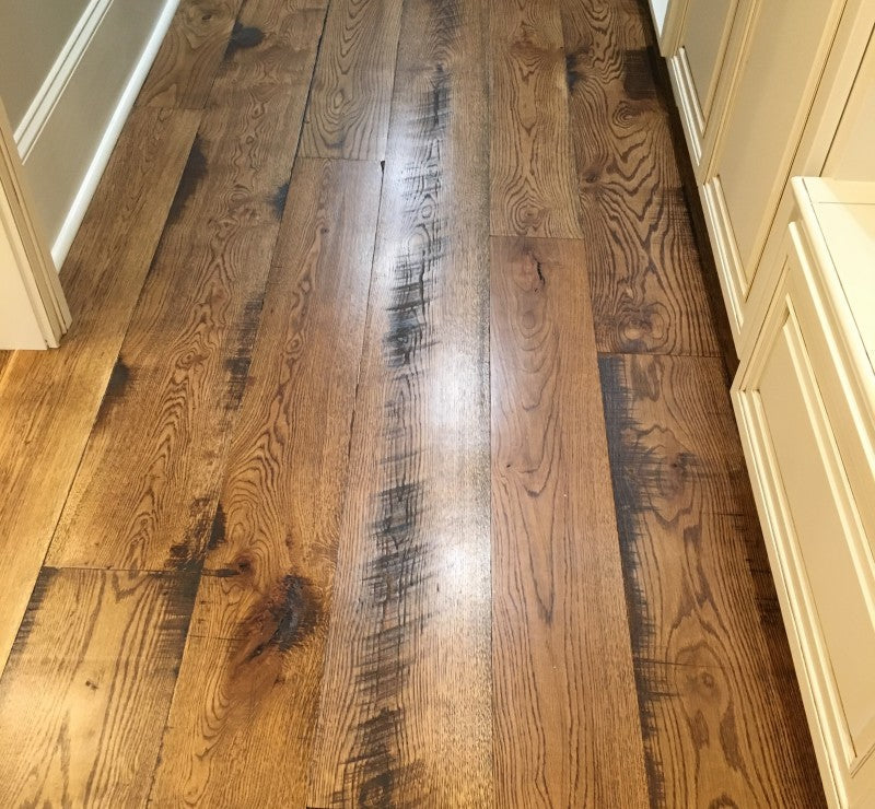 waterproof thermally modified reclaimed  flooring, installed in a bedroom