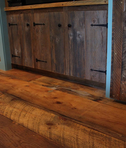 Close-up of reclaimed White Oak flooring — thermally modified, dirty top finish with circular saw marks and skip planed surface