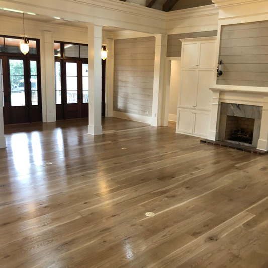 Waterproof White Oak flooring — real solid wood that installs over concrete and radiant heat. Great for bathrooms.